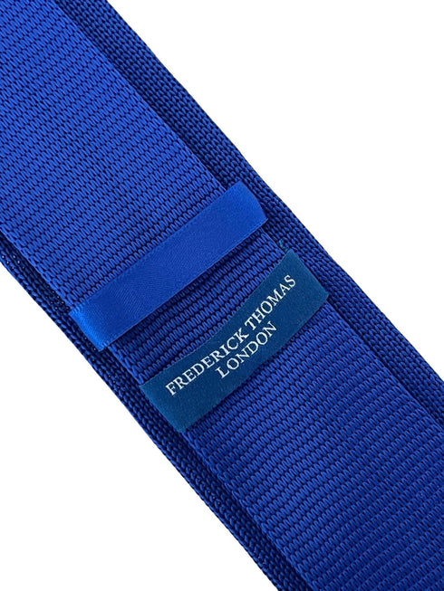 royal blue knitted tie with black nautical anchor embroidered design